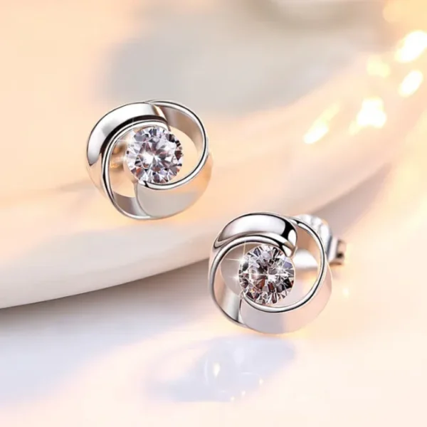 Classic Solitaire Earrings with Swirl Design