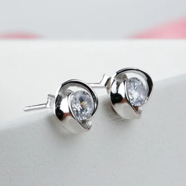 Classic Solitaire Earrings with Swirl Design